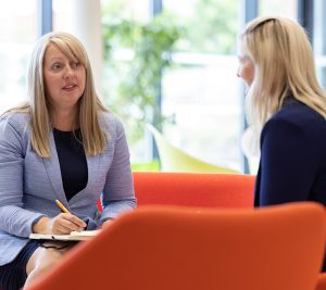 HR Staff sat talking